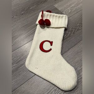 Large “C” Knit monogram Christmas stocking in white.